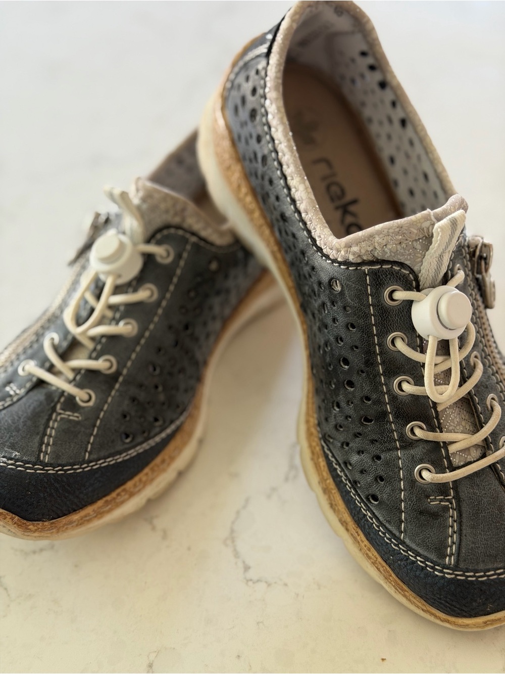 Rieker Black Perforated Casual Flats with Cream Accents